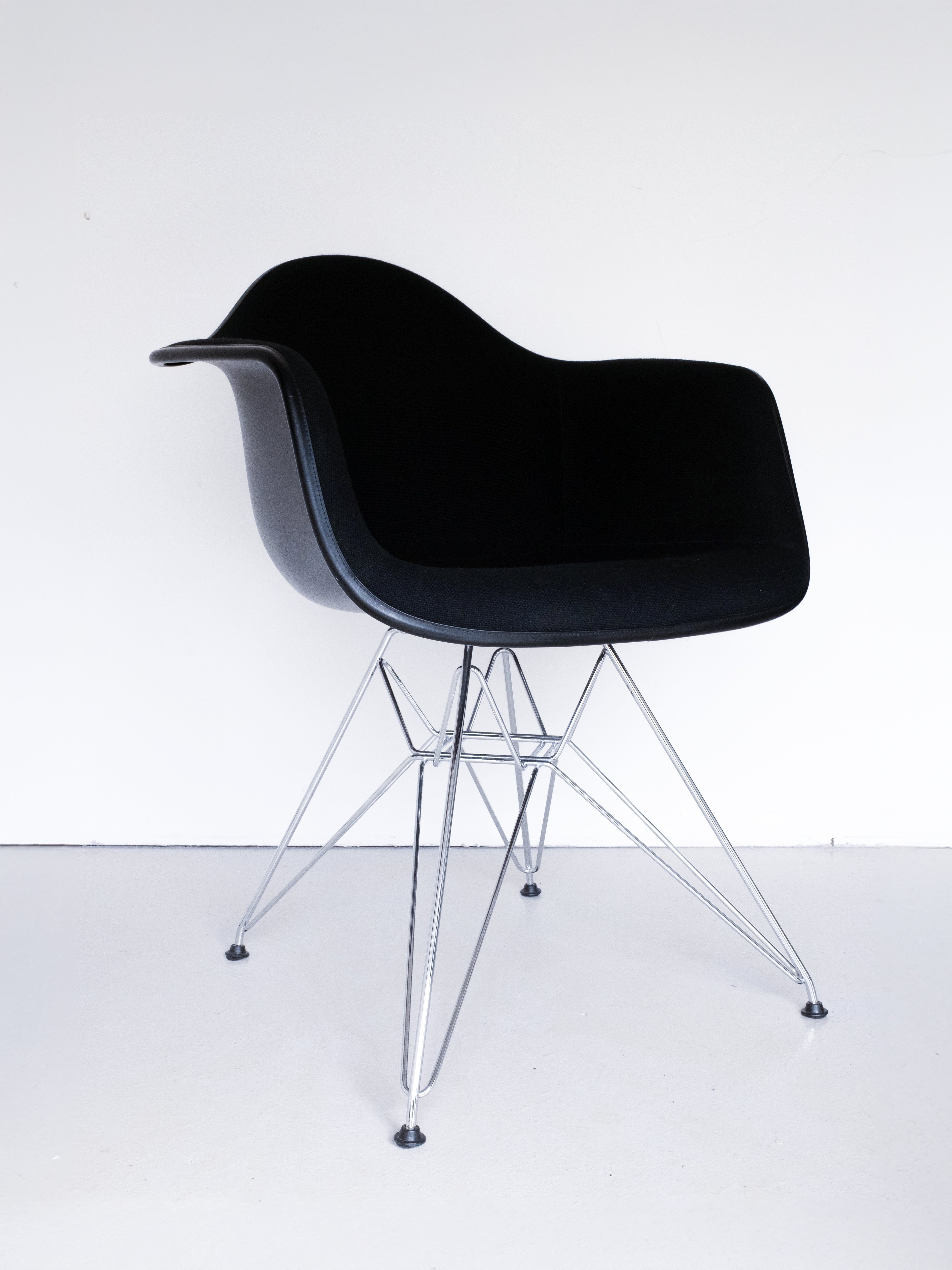 Eames Plastic Armchair DAR by Charles and Ray Eames for Vitra, 3/4 profile, black velvet armchair with chrome legs