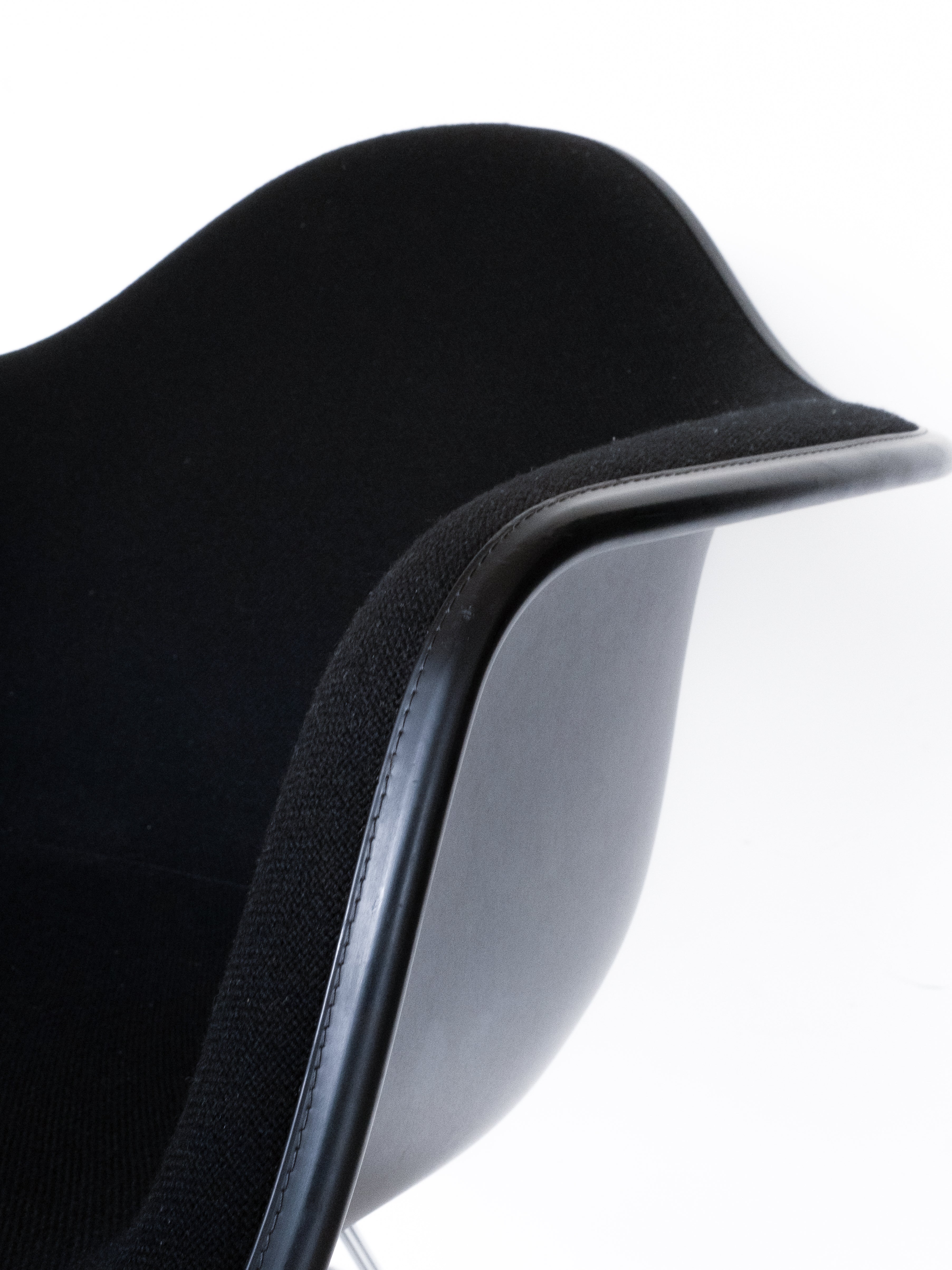 Eames DAR shell seat detail, black fabric  and recycled polypropylene, Vitra