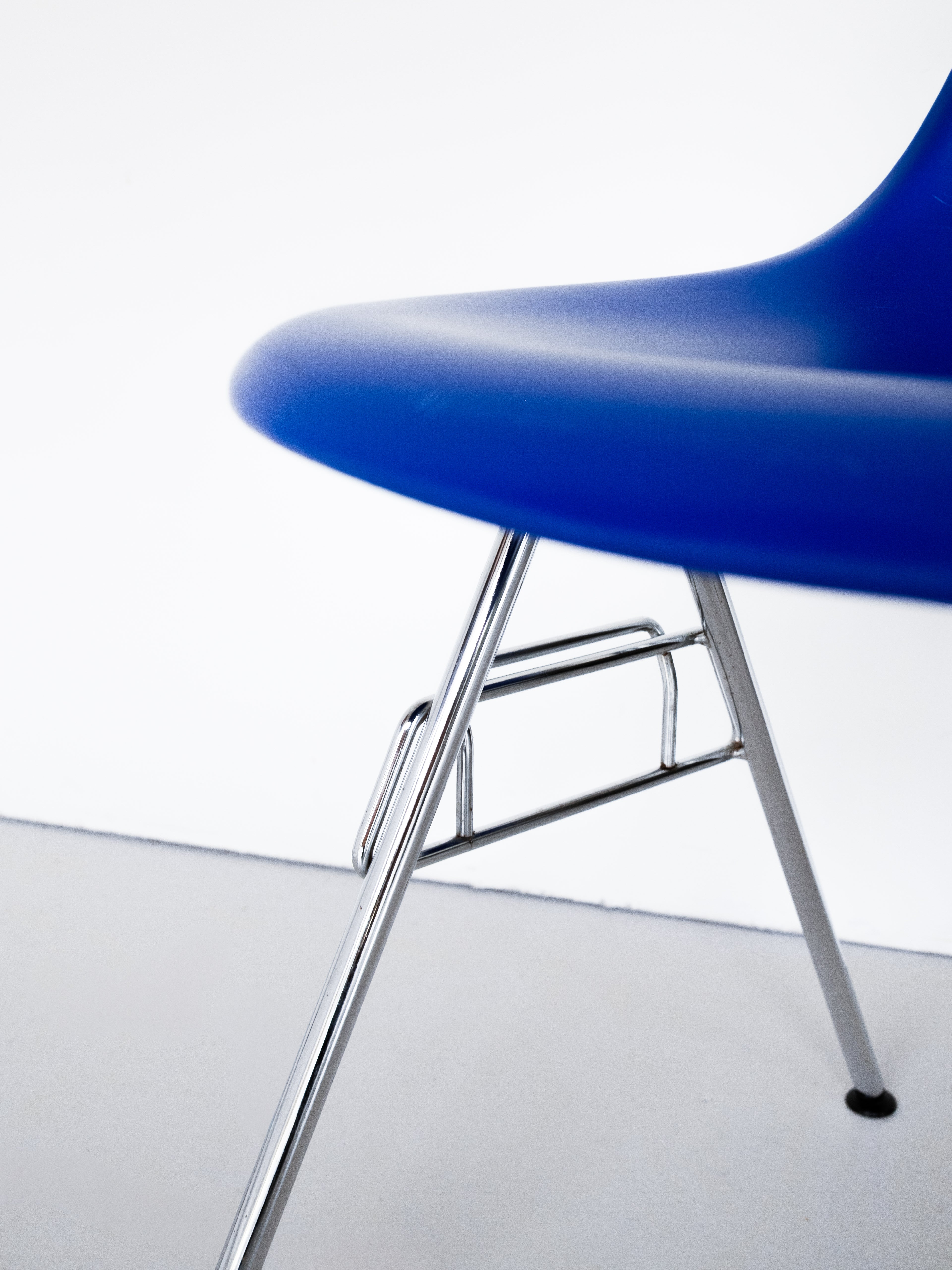 Eames DSS shell seat detail, polypropylene with chrome frame, designer mid-century modern furniture,  vintage condition