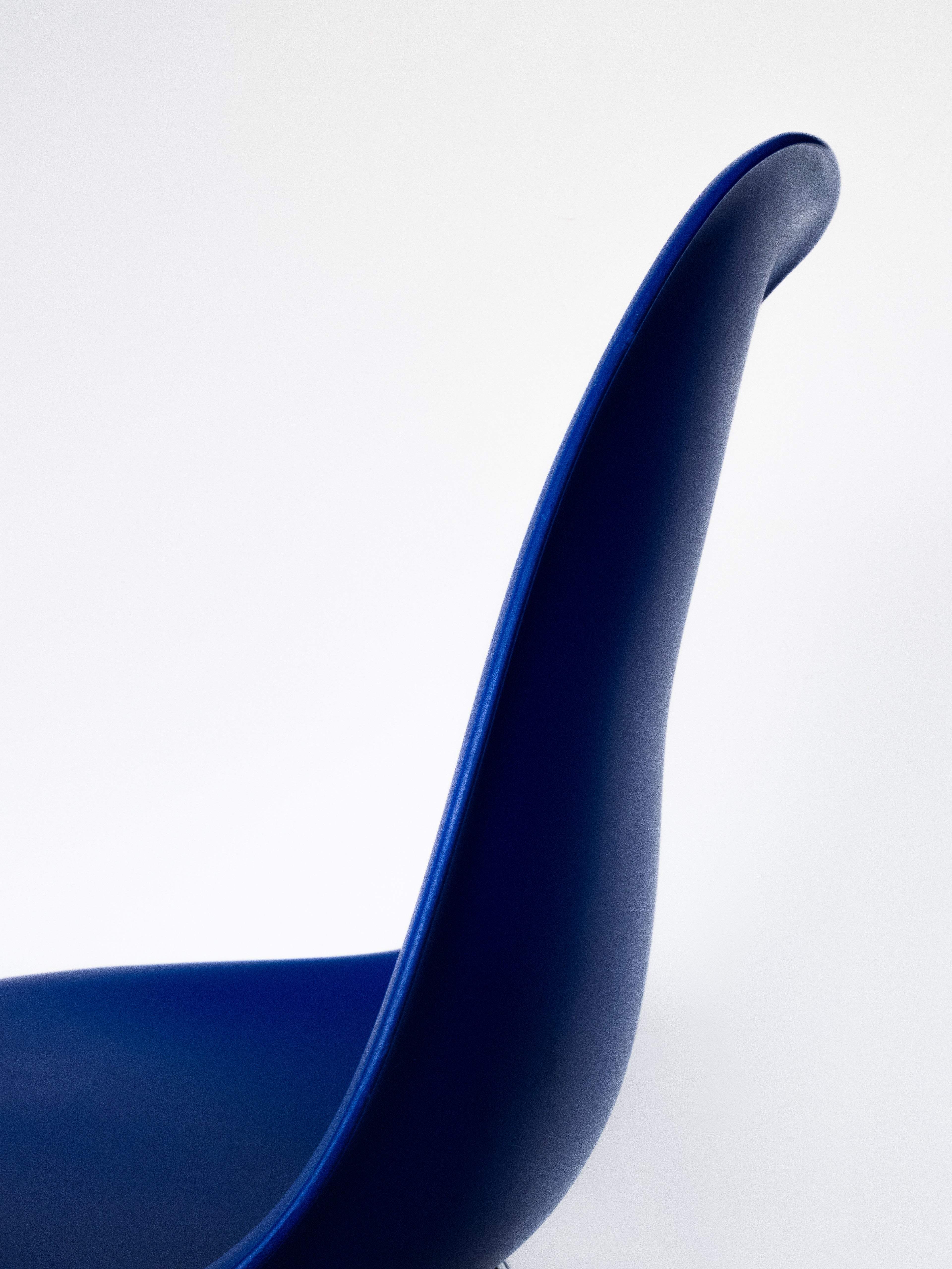 Eames DSS shell seat detail, polypropylene, designer mid-century modern furniture.