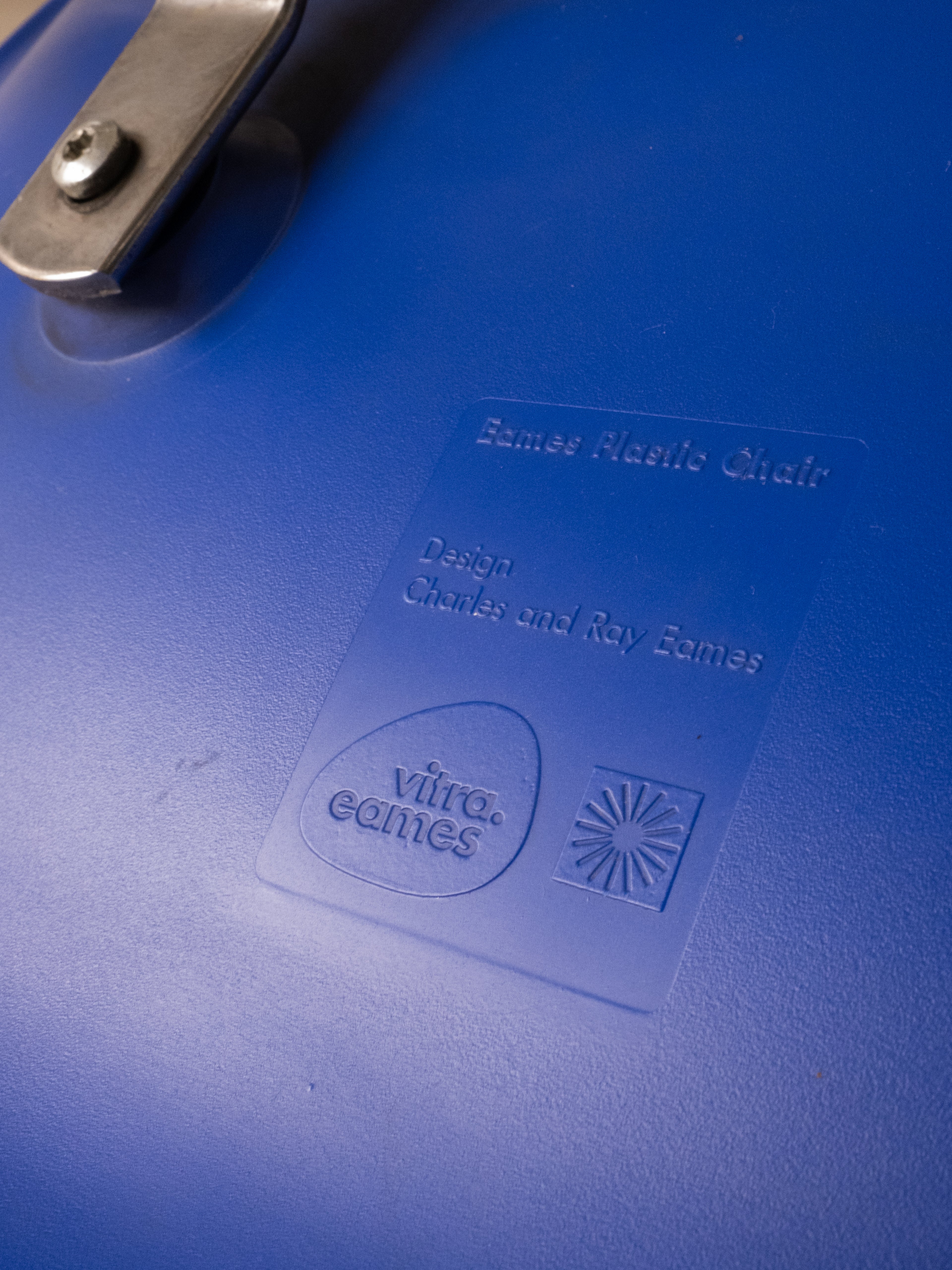 Eames Plastic Chair by Vitra, designed by Charles and Ray Eames, seat stamped, blue vintage mid-century modern furniture